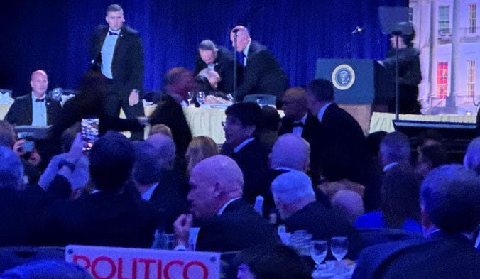 Trump Rushed to Safety After Gunshots Near Dinner